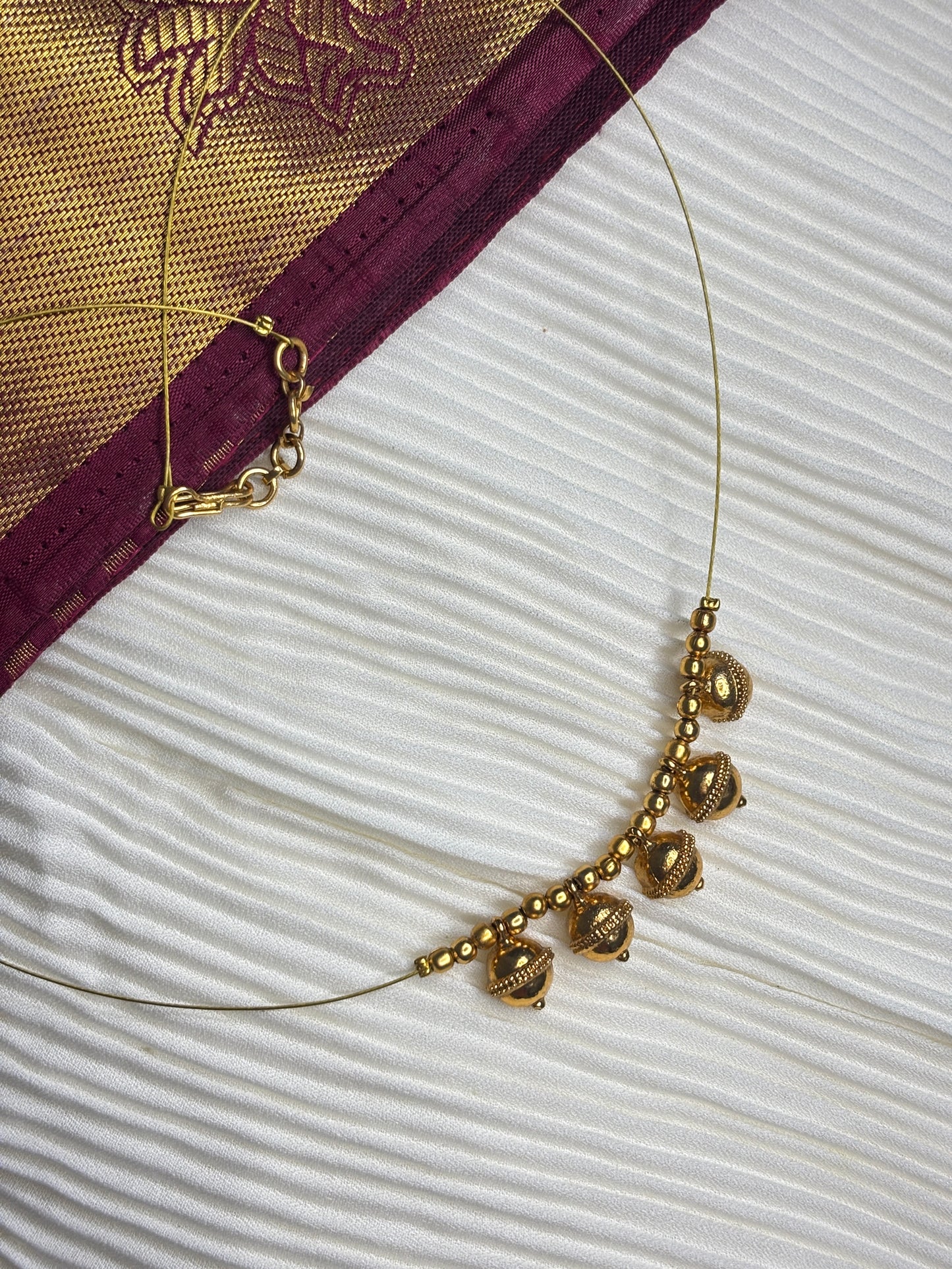 Golden Ghungroo Charm Invisible Necklace